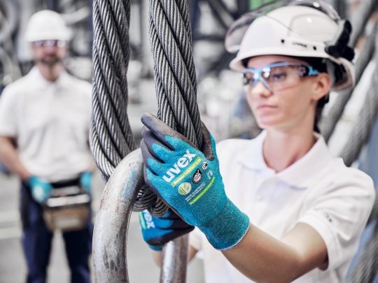 Uvex TwinFlex Bamboo Gloves Used for Precision Work in a Factory